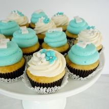 Tiffany Blue cupcakes! The customer provided the toppers and wrappers for these little beauties.